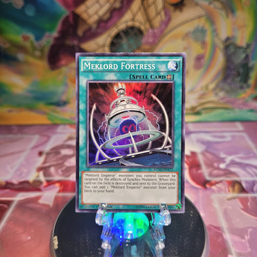 A Super Rare "Meklord Fortress" card from the Yugioh Set: Legendary Collection: 5D's.