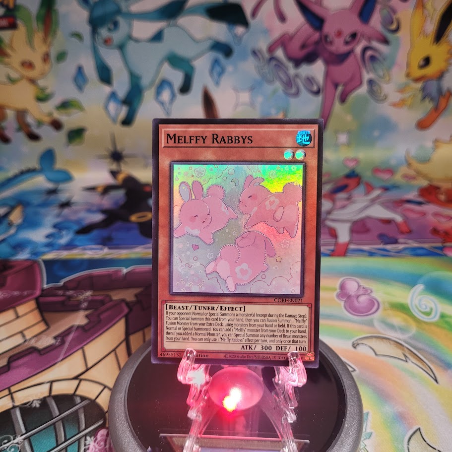 A Super Rare “Melffy Rabbys” card from the Yugioh Set: Chaos Origins (CORI).
