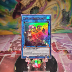 An Ultra Rare "Mermail Abyssalacia" card from the Yugioh Set: Dark Neostorm.