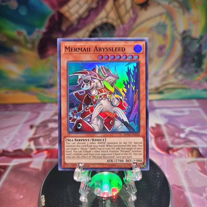 A Super Rare "Mermail Abyssleed" card from the Yugioh Set: Shadows in Valhalla.