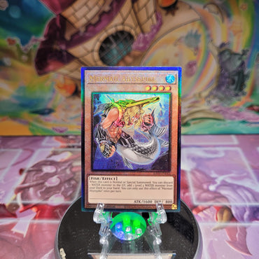 A Prismatic Ultimate Rare "Mermail Abysspike" card from the Yugioh Set: Quarter Century Stampede (RA04).