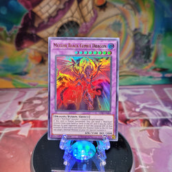 An Ultra Rare "Meteor Black Comet Dragon" card from the Yugioh Set: Ghosts From the Past.