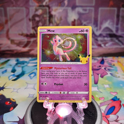 A Holo Rare "Mew" (011/025) card from the Pokemon Set: Sword & Shield: Celebrations.