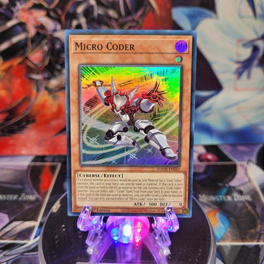 A Super Rare "Micro Coder" card from the Yugioh Set: Toon Chaos.