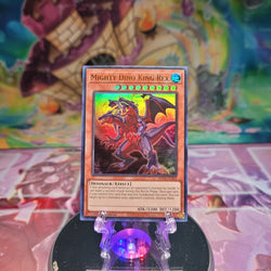 An Ultra Rare "Mighty Dino King Rex" card from the Yugioh Set: 25th Anniversary Tin: Dueling Mirrors (MP24).
