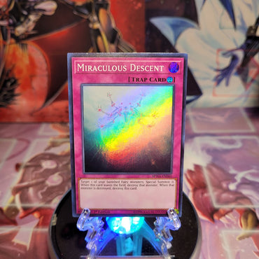 A Super Rare "Miraculous Descent" card from the Yugioh Set: Spirit Warriors.
