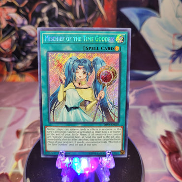 A Secret Rare "Mischief of the Time Goddess" card from the Yugioh Set: Shadows in Valhalla (SHVA).