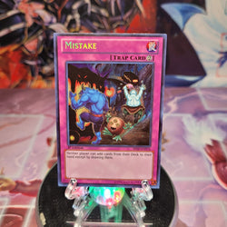 A Secret Rare "Mistake" card from the Yugioh Set: Shadow Specters (SHSP).