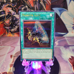 An Ultra Rare "Monster Gate" card from the Yugioh Set: Duelist Saga.