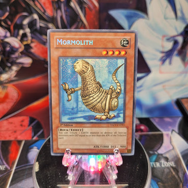 A Secret Rare "Mormolith" card from the Yugioh Set: Tactical Evolution.