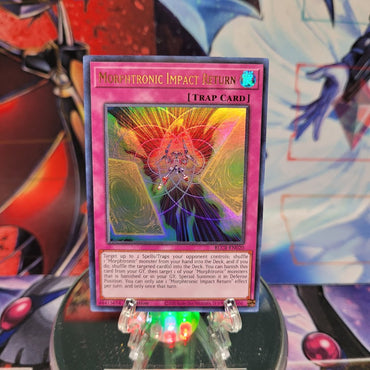 An Ultra Rare "Morphtronic Impact Return" card from the Yugioh Set: Battles of Legend: Crystal Revenge (BLCR).