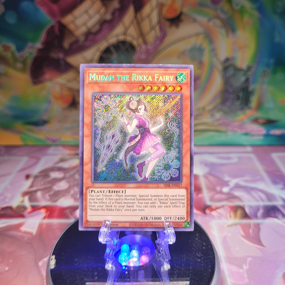 A Secret Rare "Mudan the Rikka Fairy" card from the Yugioh Set: Secret Slayers.