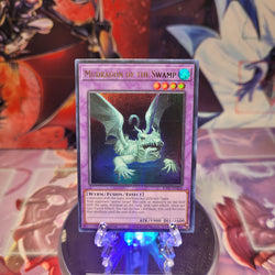 An Ultra Rare "Mudragon of the Swamp" card from the Yugioh Set: Rarity Collection 1 (RA01).