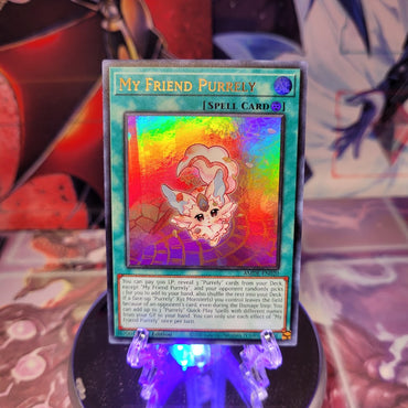 An Ultra Rare "My Friend Purrely" card from the Yugioh Set: Amazing Defenders.