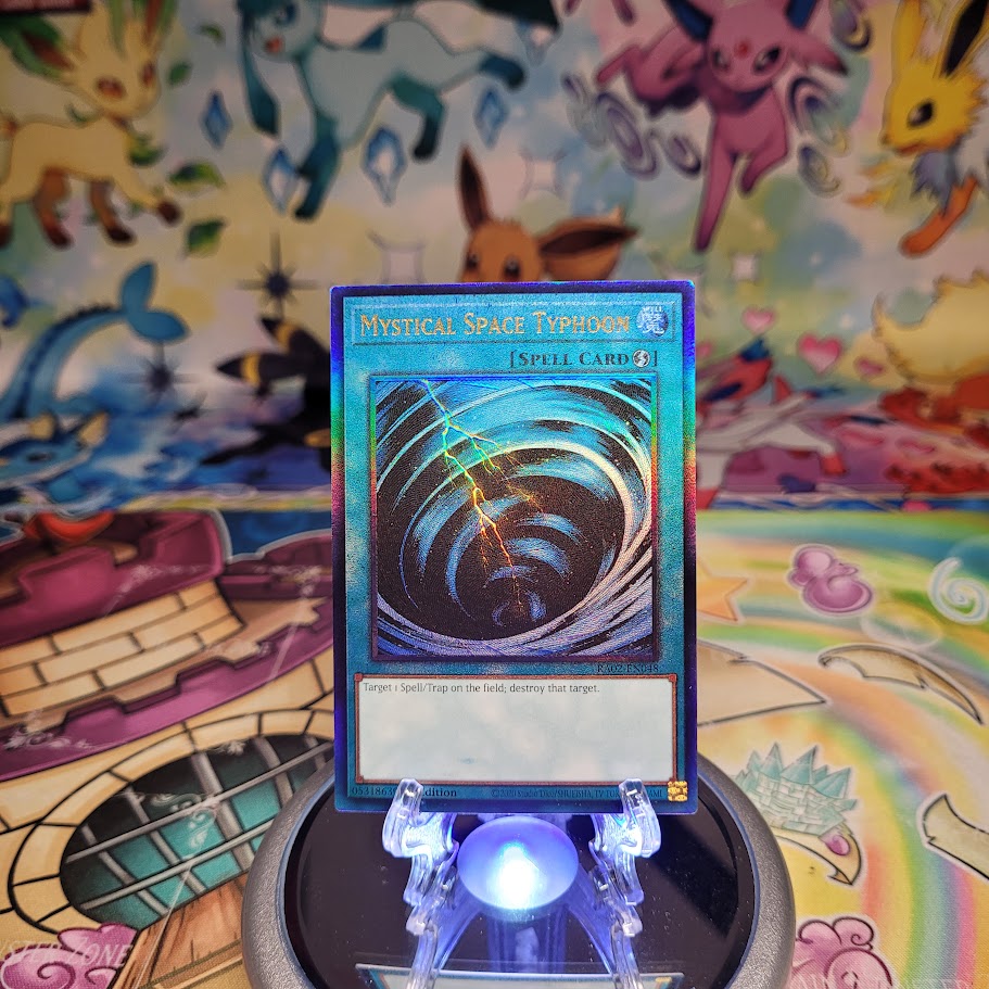 A Prismatic Ultimate Rare "Mystical Space Typhoon" card from the Yugioh Set: Rarity Collection 2 (RA02).