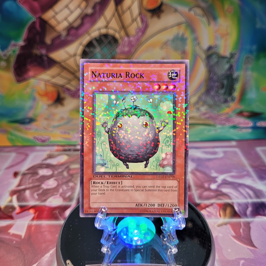 A Duel Terminal Common "Naturia Rock" card from the Yugioh Set: Duel Terminal 2 (DT02).