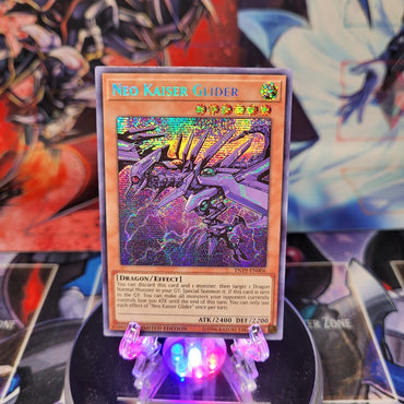 A Prismatic Secret Rare "Neo Kaiser Glider" card from the Yugioh Set: 2019 Gold Sarcophagus Mega-Tins.