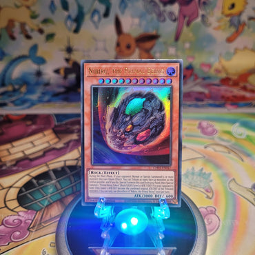 An Ultra Rare "Nibiru, the Primal Being" card from the Yugioh Structure Deck: The Fallen & The Virtuous (CH01).