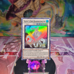 A Super Rare "Night's End Administrator" card from the Yugioh Set: Dawn of Majesty.