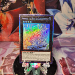 A Collector's Rare "Ninaruru, the Magistus Glass Goddess" card from the Yugioh Set: Genesis Impact (GEIM).