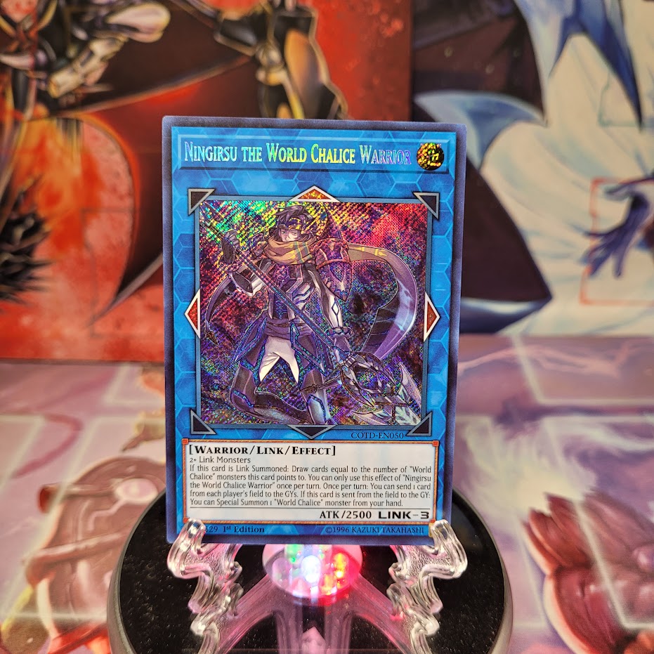 A Secret Rare "Ningirsu The World Chalice Warrior" card from the Yugioh Set: Code of the Duelist.