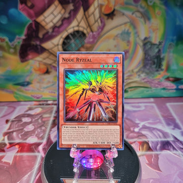 A Super Rare "Node Ryzeal" card from the Yugioh Set: Crossover Breakers.
