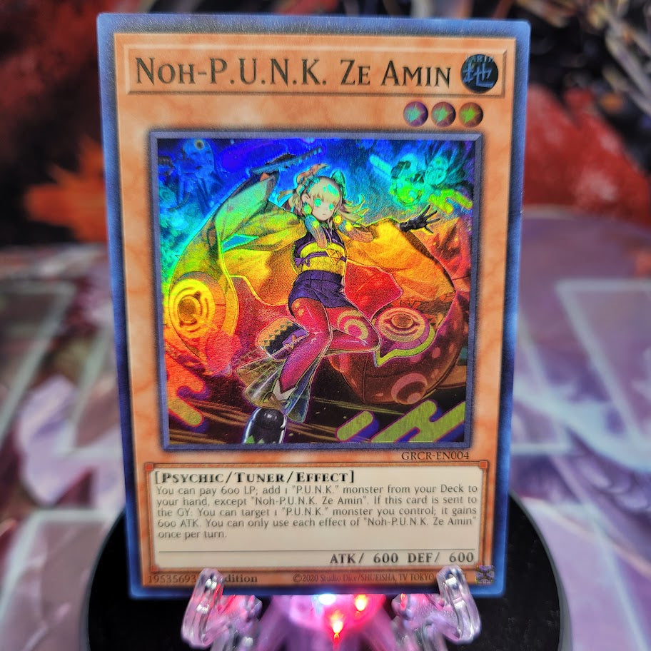  A Super Rare "Noh-P.U.N.K. Ze Amin" card from the Yugioh Set: The Grand Creators.