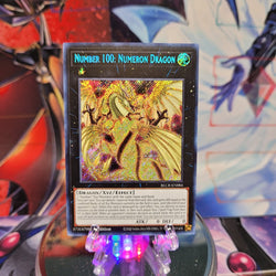 A Secret Rare "Number 100: Numeron Dragon" card from the Yugioh Set: Battles of Legend: Crystal Revenge.