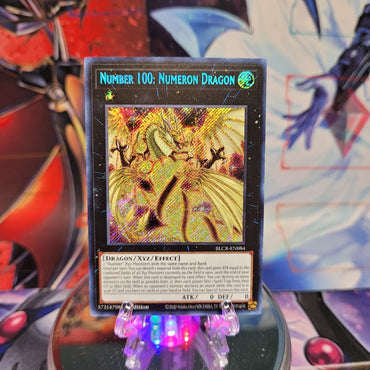 A Secret Rare "Number 100: Numeron Dragon" card from the Yugioh Set: Battles of Legend: Crystal Revenge.