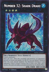 A Secret Rare "Number 32: Shark Drake" chibi art card from the Yugioh Set: Maze of Muertos (MZMU).
