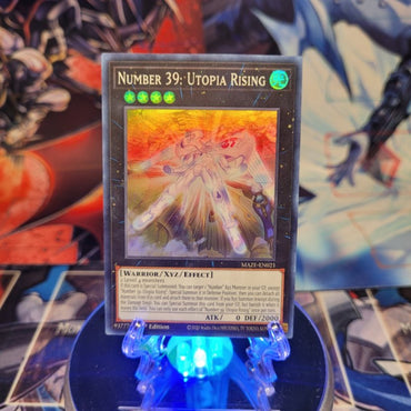 A Super Rare "Number 39: Utopia Rising" card from the Yugioh Set: Maze of Memories.