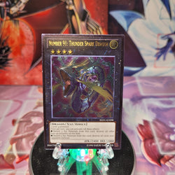 An Ultimate Rare "Number 91: Thunder Spark Dragon" card from the Yugioh Set: Return of the Duelist.