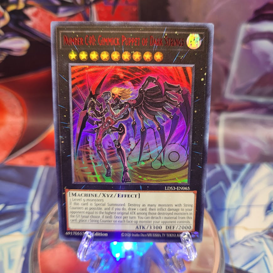 An Ultra Rare Red "Number C40: Gimmick Puppet of Dark Strings" card from the Yugioh Set: Legendary Duelists: Season 3 (LDS3).