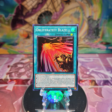 A Super Rare "Obliterate!!! Blaze" card from the Yugioh Set: The Infinite Forbidden.