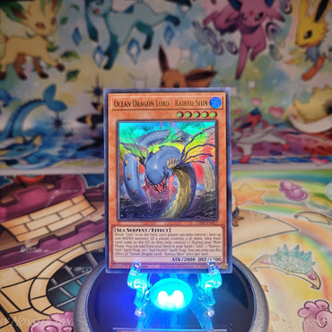 An Ultra Rare "Ocean Dragon Lord - Kairyu-Shin" card from the Yugioh Set: Legendary Duelists: Duels From the Deep (LED9).