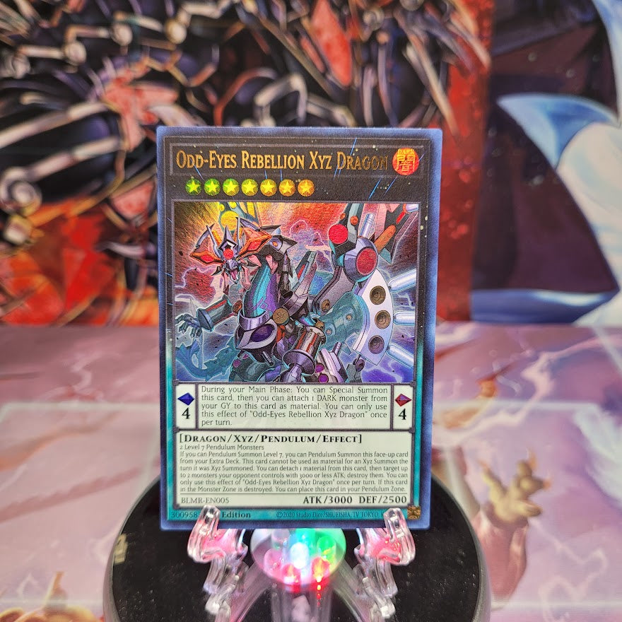 An Ultra Rare "Odd-Eyes Rebellion Xyz Dragon" card from the Yugioh Set: Battles of Legend: Monstrous Revenge (BLMR).