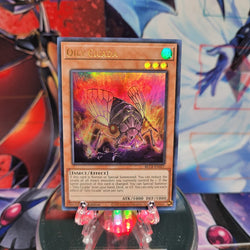 An Ultra Rare "Oily Cicada" card from the Yugioh Set: Battles of Legend: Crystal Revenge.