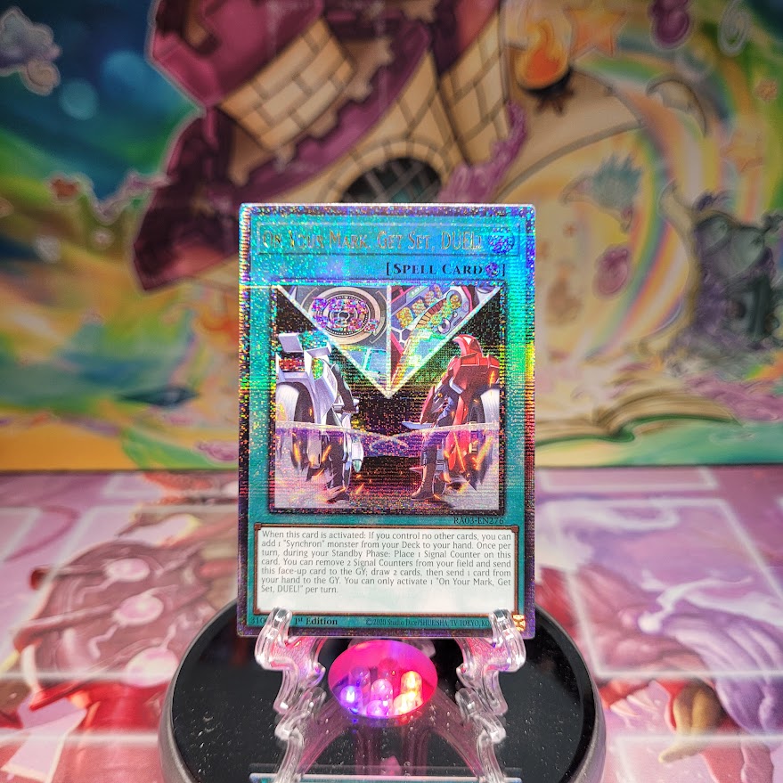  A Quarter Century Secret Rare "On Your Mark, Get Set, Duel!" card from the Yugioh Set: Quarter Century Bonanza (RA03).