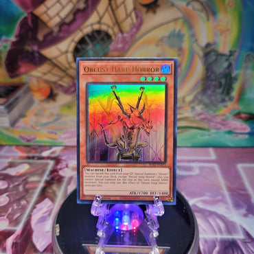 An Ultra Rare "Orcust Harp Horror" card from the Yugioh Set: Battles of Legend: Terminal Revenge.