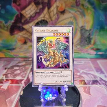 An Ultra Rare "Orient Dragon" card from the Yugioh Set: Legendary Collection 5D's.