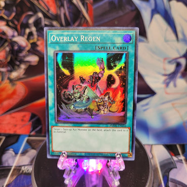 A Super Rare "Overlay Regen" card from the Yugioh Set: Amazing Defenders.