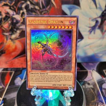 An Ultra Rare "Pandemic Dragon" card from the Yugioh Set: The Dark Side of Dimensions: Movie Pack.