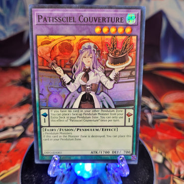  A Super Rare "Patissciel Couverture" card from the Yugioh Set: Dimension Force.