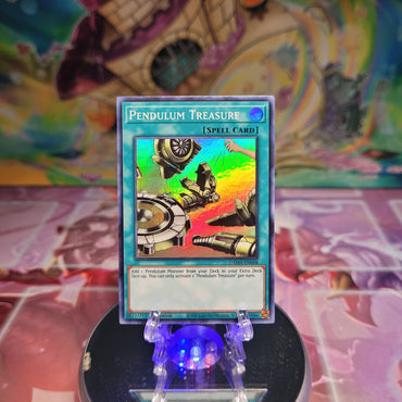 A Super Rare "Pendulum Treasure" card from the Yugioh Set: Dawn of Majesty.