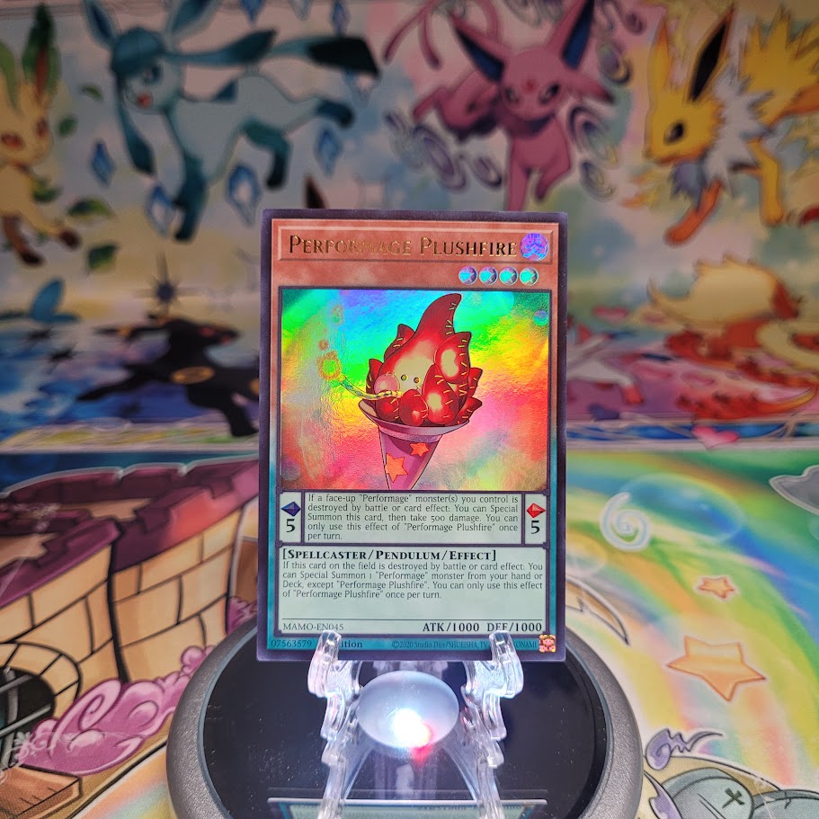 An Ultra Rare "Performage Plushfire" card from the Yugioh Set: Magnificent Monsters (MAMO).