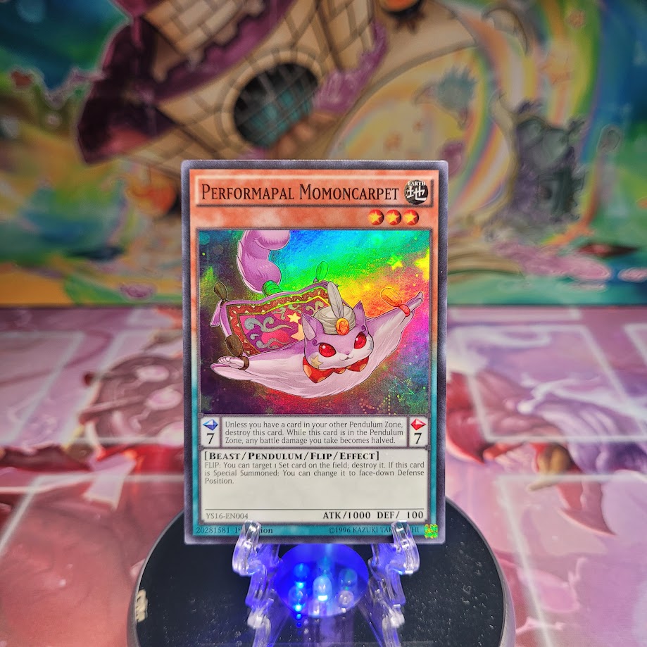 A Super Rare "Performapal Momoncarpet"  card from the Starter Deck: Yuya.