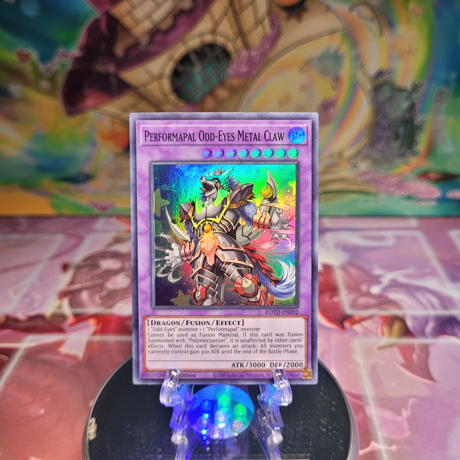 A Super Rare "Performapal Odd-Eyes Metal Claw" card from the Yugioh Set: Rise of the Duelist.