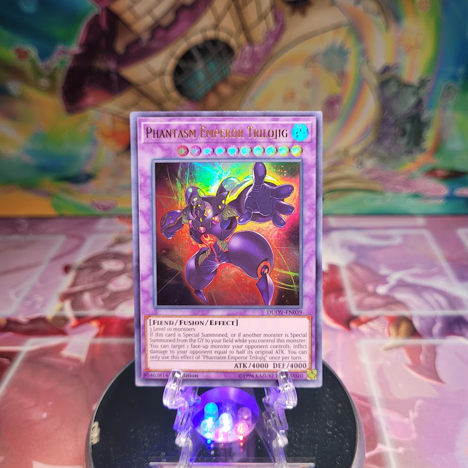 An Ultra Rare "Phantasm Emperor Trilojig" card from the Yugioh Set: Duel Overload.