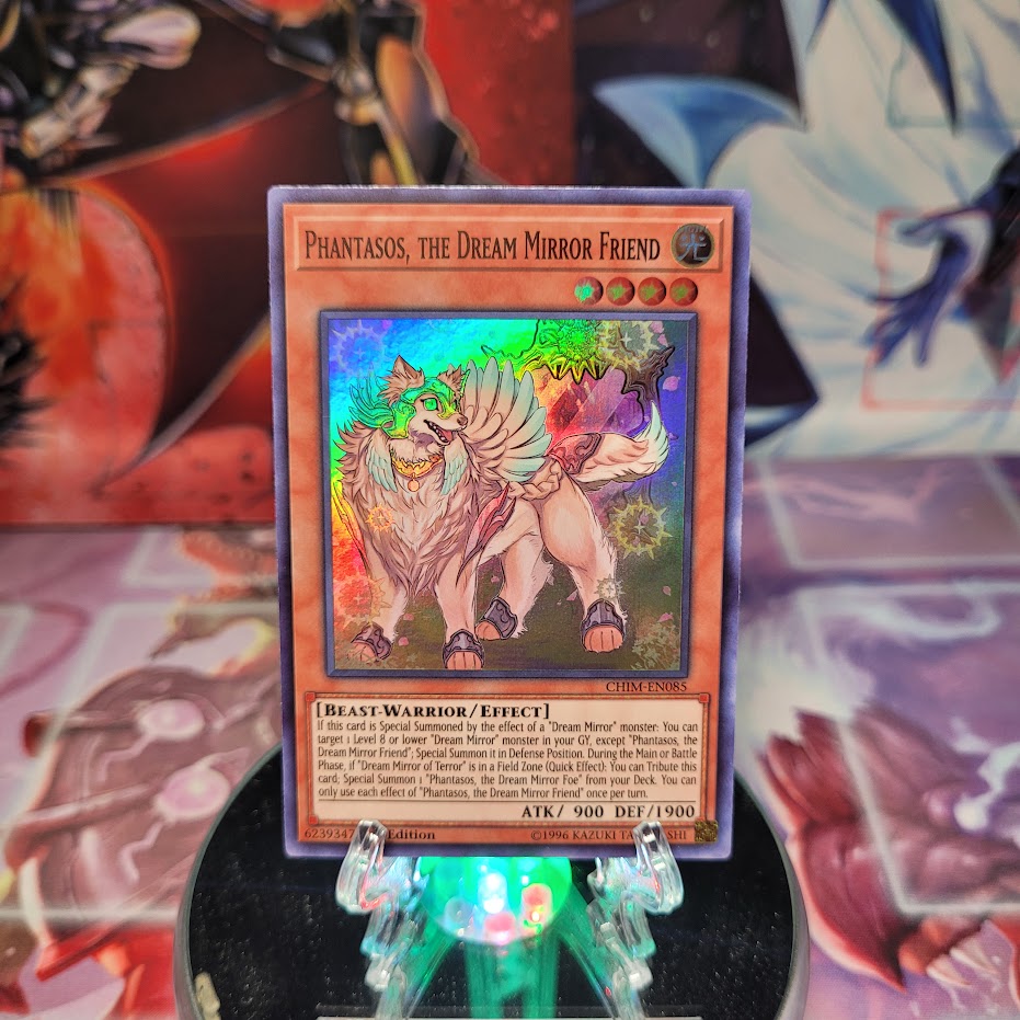 A Super Rare "Phantasos, the Dream Mirror Friend" card from the Yugioh Set: Chaos Impact.