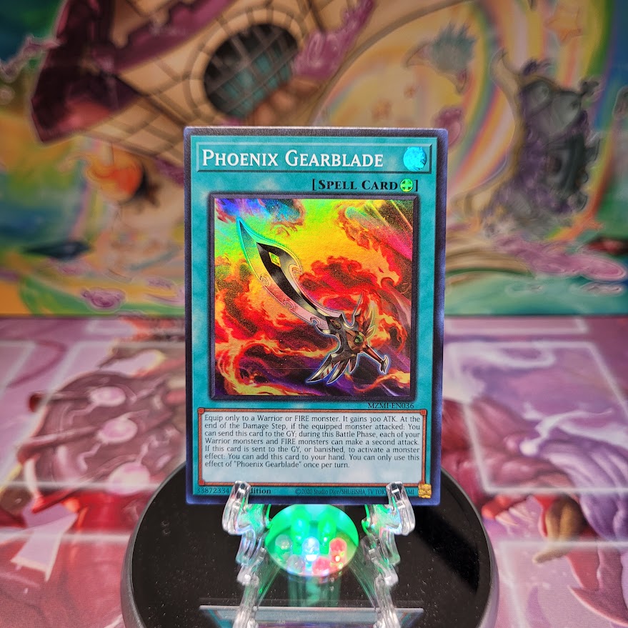 A Super Rare "Phoenix Gearblade" card from the Yugioh Set: Maze of Millennia.